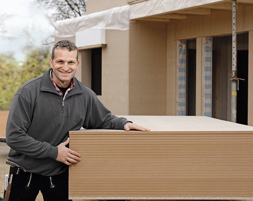 Our products help you everywhere in the warehouse. Stacks of raw panels from Pfleiderer