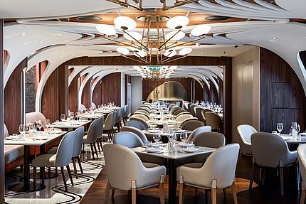 Dining area of the NCL Prima cruise ship with futuristic design