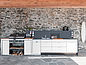 An outdoor kitchen equipped with the outdoor version of a compact board