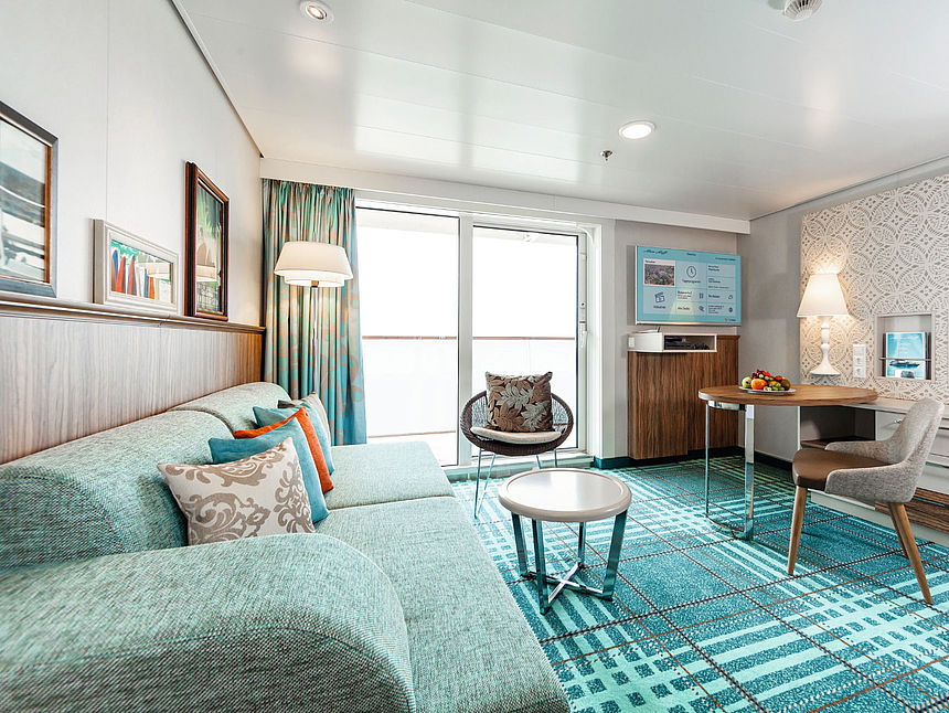 Junior Suite of AIDA Nova, equipped with products from Pfleiderer A bright and modern cabine on the AIDA Nova, in friendly white and blue colors of the products used from Pfleiderer.