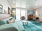 A bright and modern cabine on the AIDA Nova, in friendly white and blue colors of the products used from Pfleiderer. 