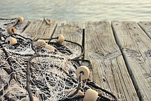 Catch of the day Fishing nets on an old wooden walkway.