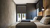 Bedroom with high-quality built-in furniture and stylish wall cladding with matt surfaces